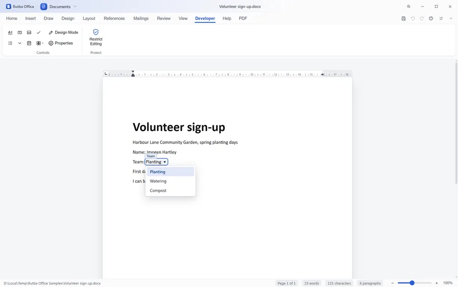 The Documents app with the Developer tab open over a volunteer sign-up form: a name filled in, a drop-down list of teams open under the Team field, a date and a ticked box
